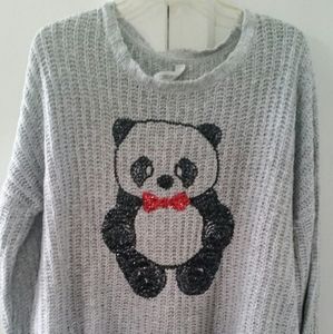 Awwwe..panda on a sweater